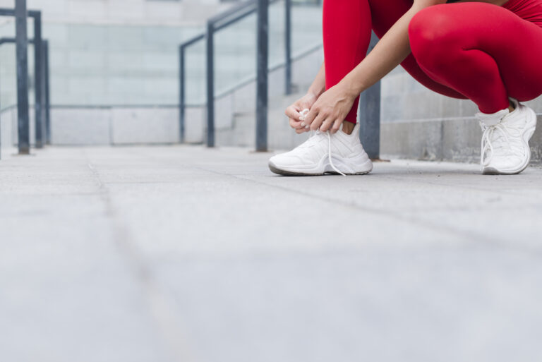 Young woman working out at the street